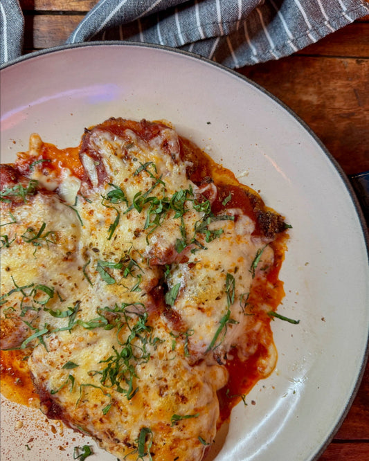 chicken thighs in Sunday Sauce company original 76